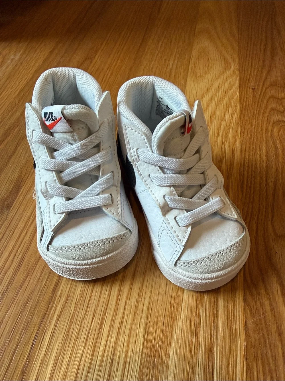 Nike Kids White Sneakers with Red Logo Accent
